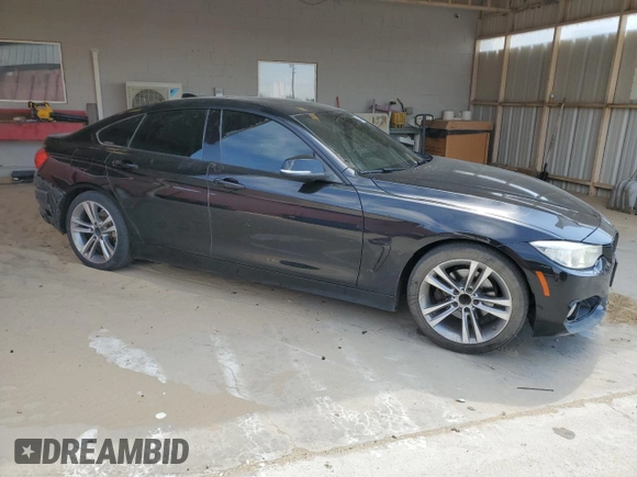 2015 BMW 4 Series 428i z VIN WBA4A9C57FD416121, wystawiony jako Copart lot #53475555 z przebiegiem 186 572 mil mil oraz Szkoda całkowita • Salvage title. Historia ofert i sprzedaży dostępna na DreamBid. Obrazek 4.