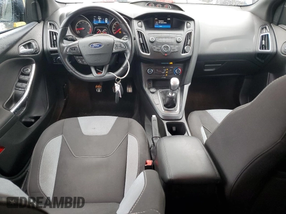 2018 Ford Focus ST with VIN 1FADP3L95JL310207, listed as a Copart auction lot 80940534 with 90,574 mi miles and Salvage Title. Bid and sale history available at DreamBid. Image 8.
