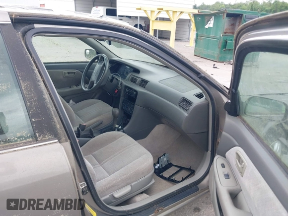 2001 Toyota Camry CE with VIN 4T1BG28K11U040227, listed as a IAAI auction lot 42220307 with 212,125 mi miles and . Bid and sale history available at DreamBid. Image 5.