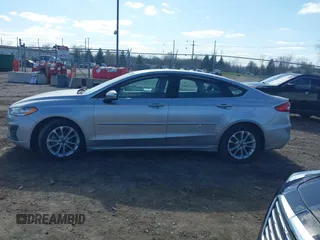 2020 Ford Fusion SE z VIN 3FA6P0LU8LR163896, wystawiony jako IAAI lot #41994803 z przebiegiem 89 892 mil mil oraz . Historia ofert i sprzedaży dostępna na DreamBid. Obrazek 14.
