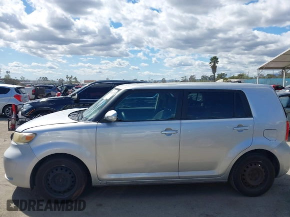 2009 Scion xB with VIN JTLKE50E991081756, listed as a IAAI auction lot 41952232 with 167,079 mi miles. Bid and sale history available at carsss.com. Image 14.