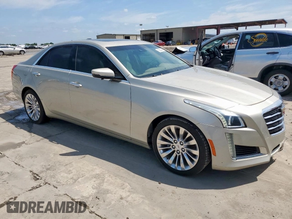 2014 Cadillac CTS Luxury AWD with VIN 1G6AX5SX2E0141251, listed as a Copart auction lot 62943445 with 85,614 mi miles and Salvage title. Bid and sale history available at DreamBid. Image 4.