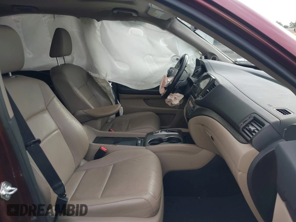 2021 Honda Pilot EX-L with VIN 5FNYF6H53MB094015, listed as a IAAI auction lot 42545722 with 66,065 mi miles and . Bid and sale history available at DreamBid. Image 5.