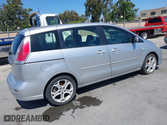 2009 Mazda 5 Touring z VIN JM1CR29L090334702, wystawiony jako IAAI lot #42349375 z przebiegiem 188 173 mil mil oraz . Historia ofert i sprzedaży dostępna na DreamBid. Obrazek 4.