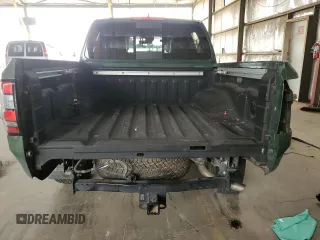 2023 Nissan Frontier Pro-4X z VIN 1N6ED1EK4PN671708, wystawiony jako Copart lot #58271305 z przebiegiem 22 906 mil mil oraz Szkoda całkowita • Salvage title. Historia ofert i sprzedaży dostępna na DreamBid. Obrazek 6.