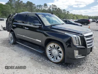 2016 Cadillac Escalade Platinum z VIN 1GYS4DKJ0GR165640, wystawiony jako Copart lot #52453805 z przebiegiem 103 086 mil mil oraz Szkoda całkowita • Salvage title. Historia ofert i sprzedaży dostępna na DreamBid. Obrazek 4.