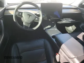 2021 Tesla Model 3 Standard Range Plus with VIN 5YJ3E1EA8MF852089, listed as a Copart auction lot 46157845 with 82,979 mi miles and Salvage Title. Bid and sale history available at DreamBid. Image 8.