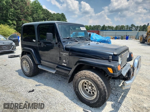 2001 Jeep Wrangler Sport с VIN 1J4FA49S91P347090, выставлен на аукционе Copart как лот 60436405 с пробегом 141 172 миль миль и Списание • Salvage title. История ставок и продаж доступна на DreamBid. Изображение 4.