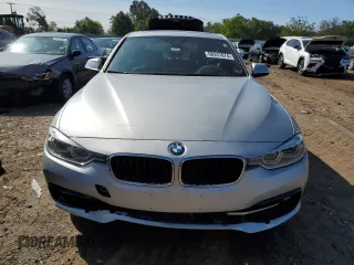 2018 BMW 3 Series with VIN WBA8F1C59JK898499, listed as a Copart auction lot 68247874 with 107,189 mi miles and Salvage title. Bid and sale history available at DreamBid. Image 5.