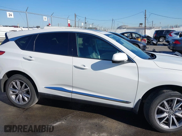 2021 Acura RDX w/Technology Package with VIN 5J8TC2H5XML019533, listed as a IAAI auction lot 41823412 with 14,020 mi miles. Bid and sale history available at carsss.com. Image 13.