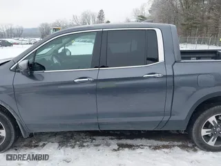 2017 Honda Ridgeline RTL-E with VIN 5FPYK3F75HB035253, listed as a IAAI auction lot 41292668 with 115,581 mi miles. Bid and sale history available at carsss.com. Image 15.