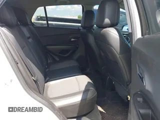 2021 Chevrolet Trax LT with VIN KL7CJLSB7MB360173, listed as a IAAI auction lot 42123356 with 106,102 mi miles and . Bid and sale history available at DreamBid. Image 8.