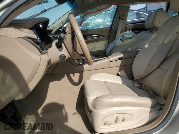 2014 Cadillac CTS Luxury AWD с VIN 1G6AX5S34E0180551, выставлен на аукционе Copart как лот 55983015 с пробегом Не указан миль и Списание • Salvage title. История ставок и продаж доступна на DreamBid. Изображение 7.