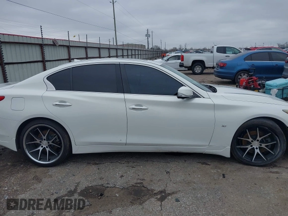 2014 Infiniti Q50 Sport with VIN JN1BV7AP1EM688494, listed as a IAAI auction lot 41622119 with 152,881 mi miles and . Bid and sale history available at DreamBid. Image 13.