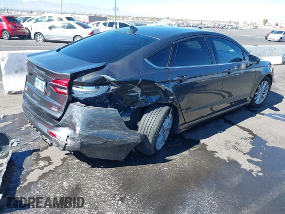 2019 Ford Fusion SE with VIN 3FA6P0HD5KR176497, listed as a IAAI auction lot 41633087 with 103,876 mi miles and . Bid and sale history available at carsss.com. Image 4.