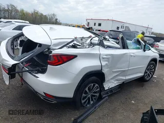2021 Lexus RX with VIN 2T2HZMDA3MC282824, listed as a IAAI auction lot 42019255 with 1 mi miles. Bid and sale history available at carsss.com. Image 6.