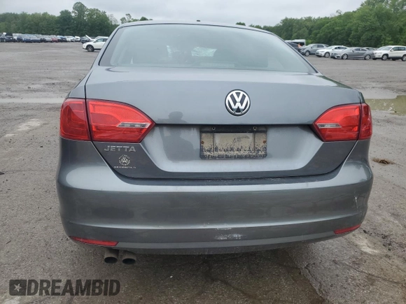 2013 Volkswagen Jetta S with VIN 3VW2K7AJ4DM318853, listed as a Copart auction lot 57597955 with 165,023 mi miles and Salvage title. Bid and sale history available at DreamBid. Image 6.