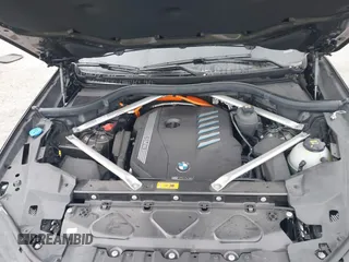 2022 BMW X5 xDrive45e z VIN 5UXTA6C00N9L06383, wystawiony jako IAAI lot #38552162 z przebiegiem 19 592 mil mil oraz . Historia ofert i sprzedaży dostępna na DreamBid. Obrazek 10.