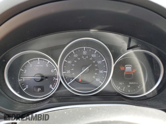 2018 Mazda CX-5 Grand Touring z VIN JM3KFADM2J1381752, wystawiony jako Copart lot #56889835 z przebiegiem 96 820 mil mil oraz Szkoda całkowita • Salvage title. Historia ofert i sprzedaży dostępna na DreamBid. Obrazek 9.