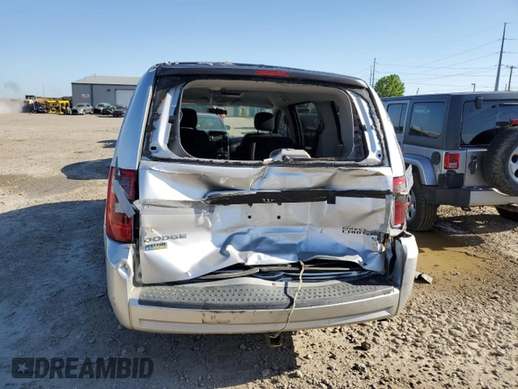 2009 Dodge Grand Caravan SE z VIN 1D8HN44E19B520096, wystawiony jako Copart lot #56339405 z przebiegiem 152 655 mil mil oraz Czysty tytuł • Clean title. Historia ofert i sprzedaży dostępna na DreamBid. Obrazek 6.