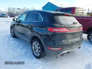 2015 Lincoln MKC with VIN 5LMTJ2AHXFUJ01440, listed as a IAAI auction lot 41526975 with 104,280 mi miles. Bid and sale history available at carsss.com. Image 3.