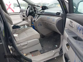 2012 Honda Odyssey EX with VIN 5FNRL5H47CB105451, listed as a IAAI auction lot 41872967 with 295,947 mi miles and . Bid and sale history available at carsss.com. Image 5.