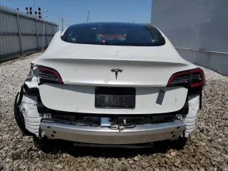 2020 Tesla Model 3 Standard Range Plus with VIN 5YJ3E1EA3LF612365, listed as a Copart auction lot 54421205 with Not Provided miles and Clean Title. Bid and sale history available at DreamBid. Image 6.