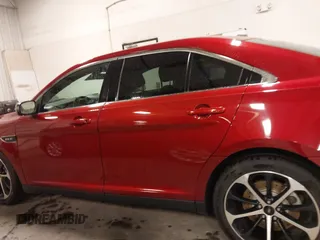 2014 Ford Taurus SHO with VIN 1FAHP2KT9EG130834, listed as a IAAI auction lot 41748199 with 98,857 mi miles and . Bid and sale history available at carsss.com. Image 15.