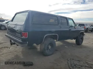 1989 GMC Suburban z VIN 1GKGV26K0KF517730, wystawiony jako Copart lot #41437715 z przebiegiem 21 423 mil mil oraz Szkody całkowita. Historia ofert i sprzedaży dostępna na DreamBid. Obrazek 3.