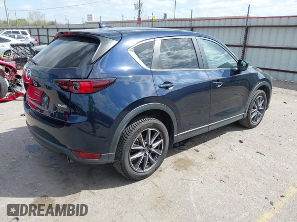 2018 Mazda CX-5 Touring with VIN JM3KFACM3J1370129, listed as a IAAI auction lot 41829027 with 71,305 mi miles. Bid and sale history available at carsss.com. Image 4.