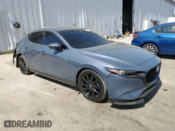 2021 Mazda 3 Premium with VIN JM1BPAML9M1307522, listed as a Copart auction lot 54628365 with 71,994 mi miles and Salvage title. Bid and sale history available at DreamBid. Image 4.