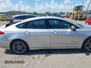 2017 Ford Fusion Hybrid SE with VIN 3FA6P0LU4HR234101, listed as a IAAI auction lot 42579447 with 169,273 mi miles and . Bid and sale history available at DreamBid. Image 13.