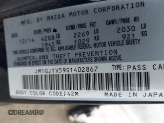 2016 Mazda Mazda6 i Touring with VIN JM1GJ1V59G1402867, listed as a IAAI auction lot 41998212 with 135,724 mi miles. Bid and sale history available at carsss.com. Image 9.