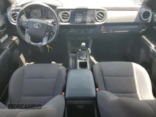 2019 Toyota Tacoma SR with VIN 3TMCZ5AN2KM277551, listed as a Copart auction lot 61586585 with 59,670 mi miles and Salvage title. Bid and sale history available at DreamBid. Image 8.