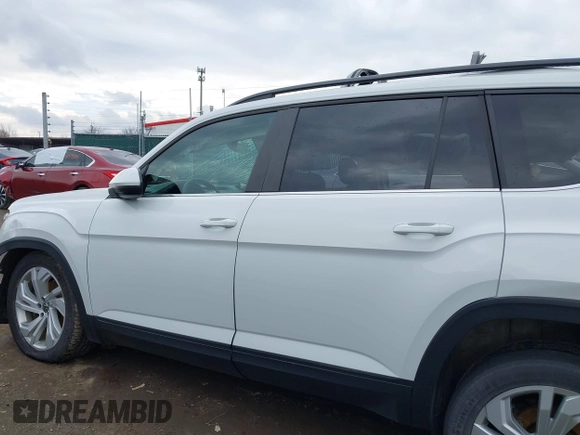 2022 Volkswagen Atlas SE z VIN 1V2KR2CA0NC517561, wystawiony jako IAAI lot #41653225 z przebiegiem 40 782 mil mil oraz . Historia ofert i sprzedaży dostępna na DreamBid. Obrazek 15.
