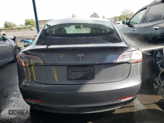 2023 Tesla Model 3 with VIN 5YJ3E1EA0PF449499, listed as a Copart auction lot 52900515 with 42,706 mi miles and Non Repairable. Bid and sale history available at DreamBid. Image 6.