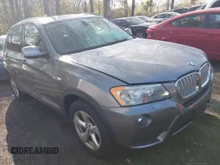 2011 BMW X3 28i with VIN 5UXWX5C55BL708710, listed as a IAAI auction lot 41940504 with 162,240 mi miles. Bid and sale history available at carsss.com. Image 1.