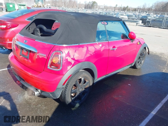 2009 MINI Convertible with VIN WMWMR33569TU95961, listed as a IAAI auction lot 41689845 with 107,934 mi miles and . Bid and sale history available at DreamBid. Image 4.