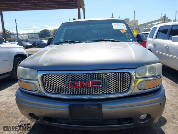2005 GMC Yukon Denali with VIN 1GKEK63U35J149963, listed as a IAAI auction lot 41829530 with 243,575 mi miles. Bid and sale history available at carsss.com. Image 6.