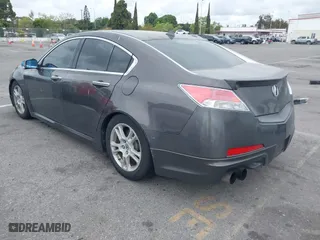 2009 Acura TL Tech with VIN 19UUA86519A014157, listed as a IAAI auction lot 42058423 with 201,403 mi miles. Bid and sale history available at carsss.com. Image 3.