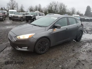 2017 Ford Focus Titanium with VIN 1FADP3N20HL255210, listed as a Copart auction lot 85512034 with 136,715 mi miles and Salvage Title. Bid and sale history available at carsss.com. Image 1.