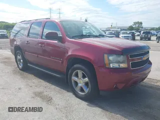 2007 Chevrolet Suburban LTZ with VIN 3GNFK16317G103758, listed as a IAAI auction lot 39784129 with 335,628 mi miles. Bid and sale history available at carsss.com. Image 1.