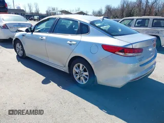 2016 Kia Optima LX with VIN 5XXGT4L37GG084538, listed as a IAAI auction lot 41784807 with 128,928 mi miles. Bid and sale history available at carsss.com. Image 3.
