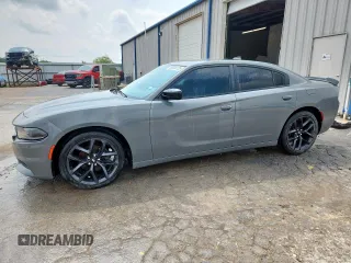 2019 Dodge Charger SXT z VIN 2C3CDXBG0KH540908, wystawiony jako Copart lot #58938725 z przebiegiem 79 620 mil mil oraz Czysty tytuł • Clean title. Historia ofert i sprzedaży dostępna na DreamBid. Obrazek 1.