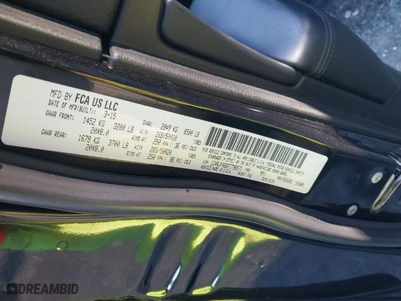 2015 Jeep Grand Cherokee Altitude with VIN 1C4RJFAG6FC796571, listed as a IAAI auction lot 41258471 with 104,049 mi miles. Bid and sale history available at carsss.com. Image 9.