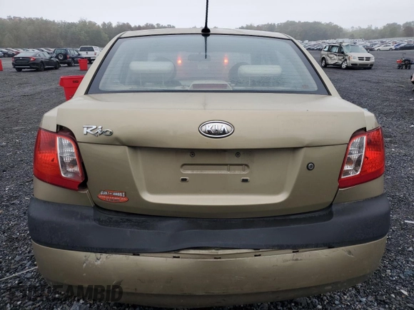 2009 Kia Rio LX with VIN KNADE223096485561, listed as a Copart auction lot 73412874 with 137,858 mi miles and Salvage Title. Bid and sale history available at DreamBid. Image 6.