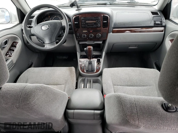 2005 Suzuki XL7 LX with VIN JS3TX92V054108383, listed as a Copart auction lot 85280414 with 128,594 mi miles and Salvage title. Bid and sale history available at DreamBid. Image 8.