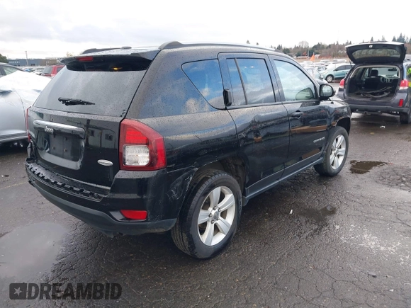 2016 Jeep Compass High Altitude Edition with VIN 1C4NJDEB6GD674564, listed as a IAAI auction lot 41783578 with 98,599 mi miles. Bid and sale history available at carsss.com. Image 4.
