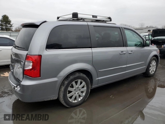 2014 Chrysler Town & Country Touring with VIN 2C4RC1BG7ER159979, listed as a Copart auction lot 41546834 with 148,000 mi miles and Salvage Title. Bid and sale history available at DreamBid. Image 3.