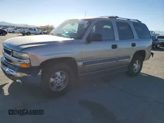 2002 Chevrolet Tahoe LS with VIN 1GNEC13V82R153063, listed as a Copart auction lot 84180594 with 148,190 mi miles and Salvage Title. Bid and sale history available at carsss.com. Image 1.